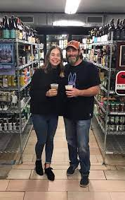 John Boy with his daughter at Sam's Bottle Shop