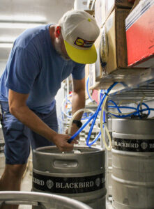 Deke changing a keg